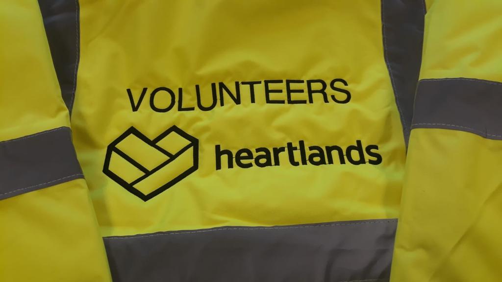 Heartlands volunteer branding printed on hi-vis workwear