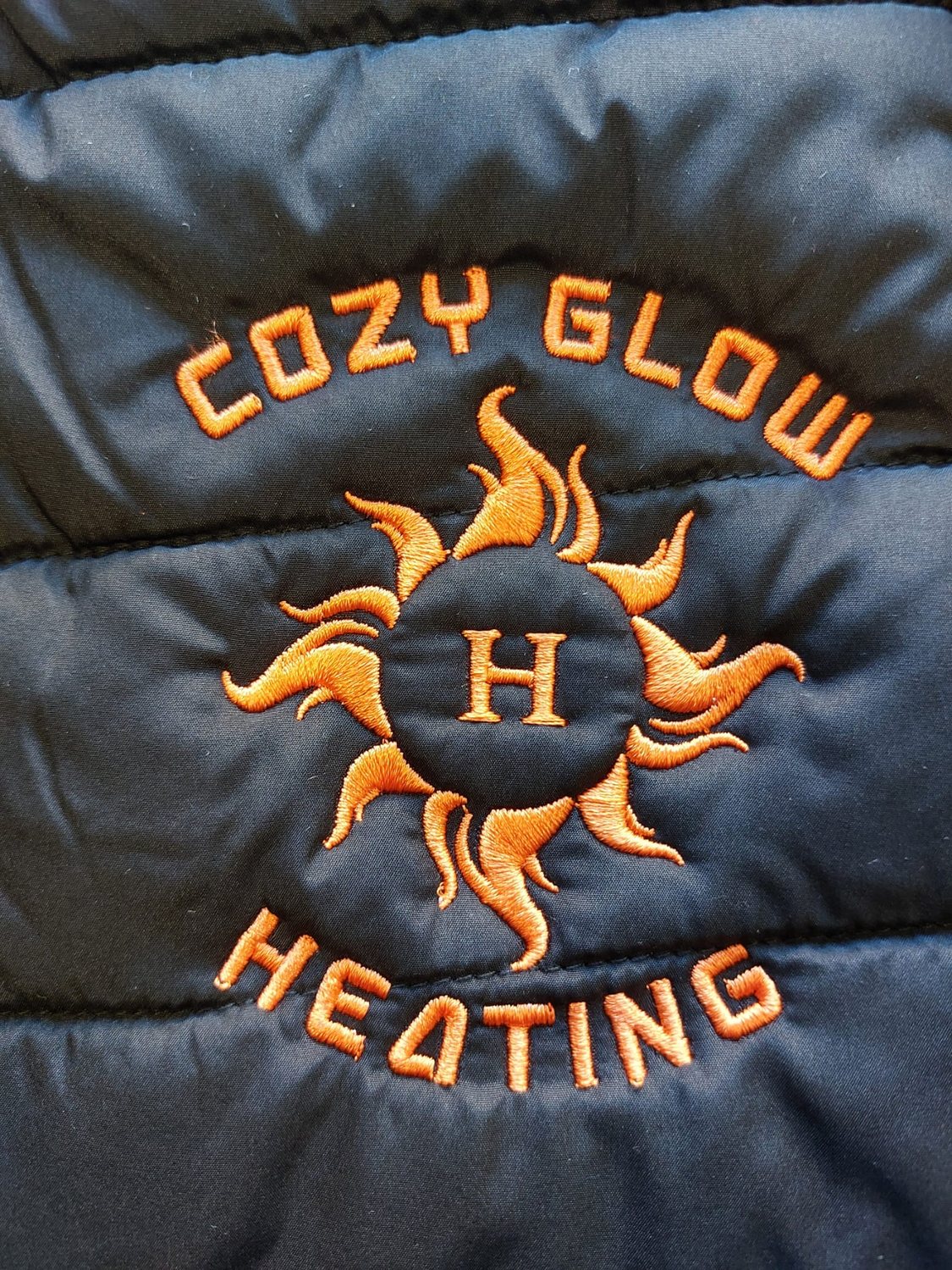Real WearYourLogo customer work: branded outerwear