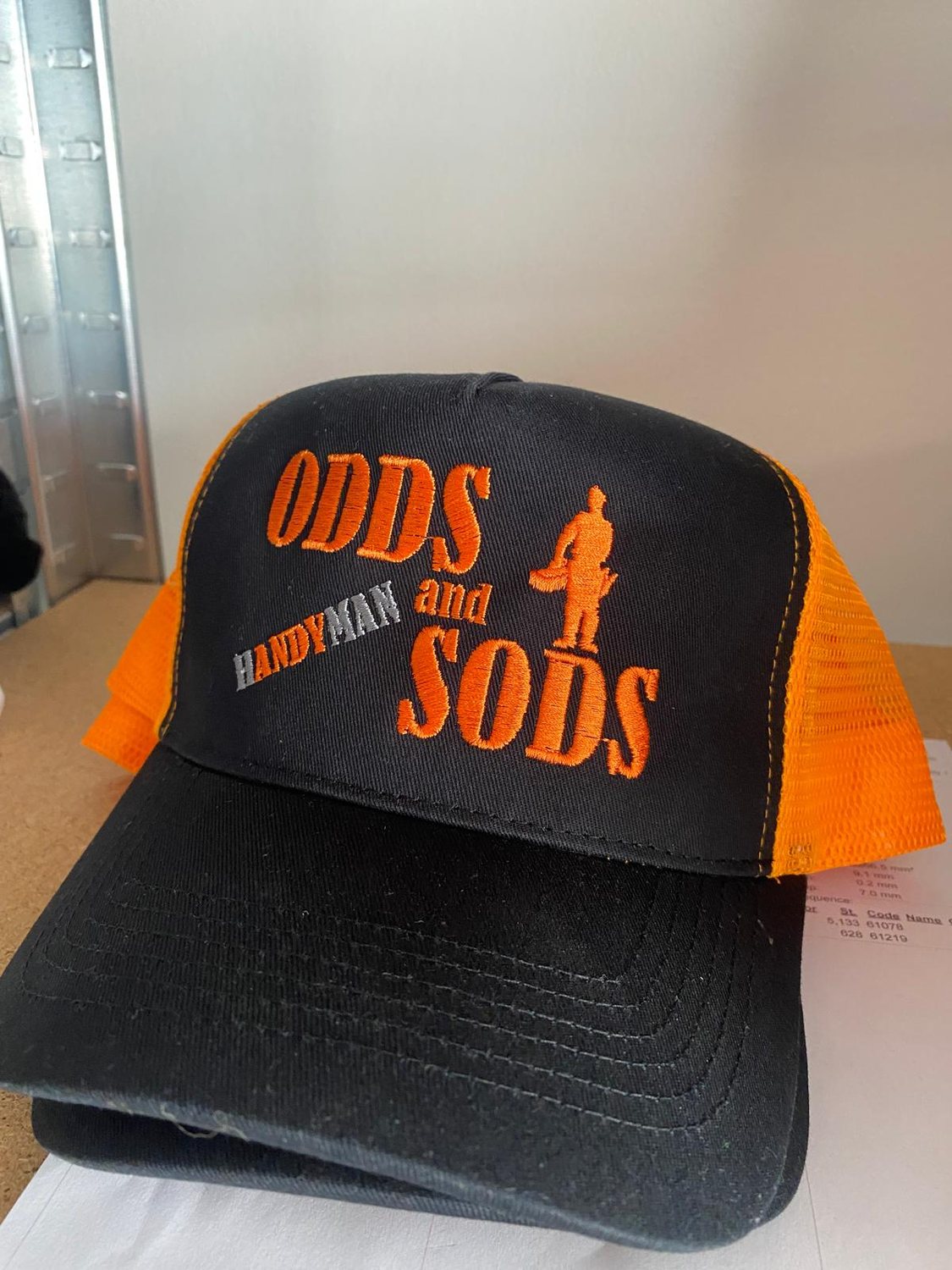 Real WearYourLogo customer work: embroidered headwear