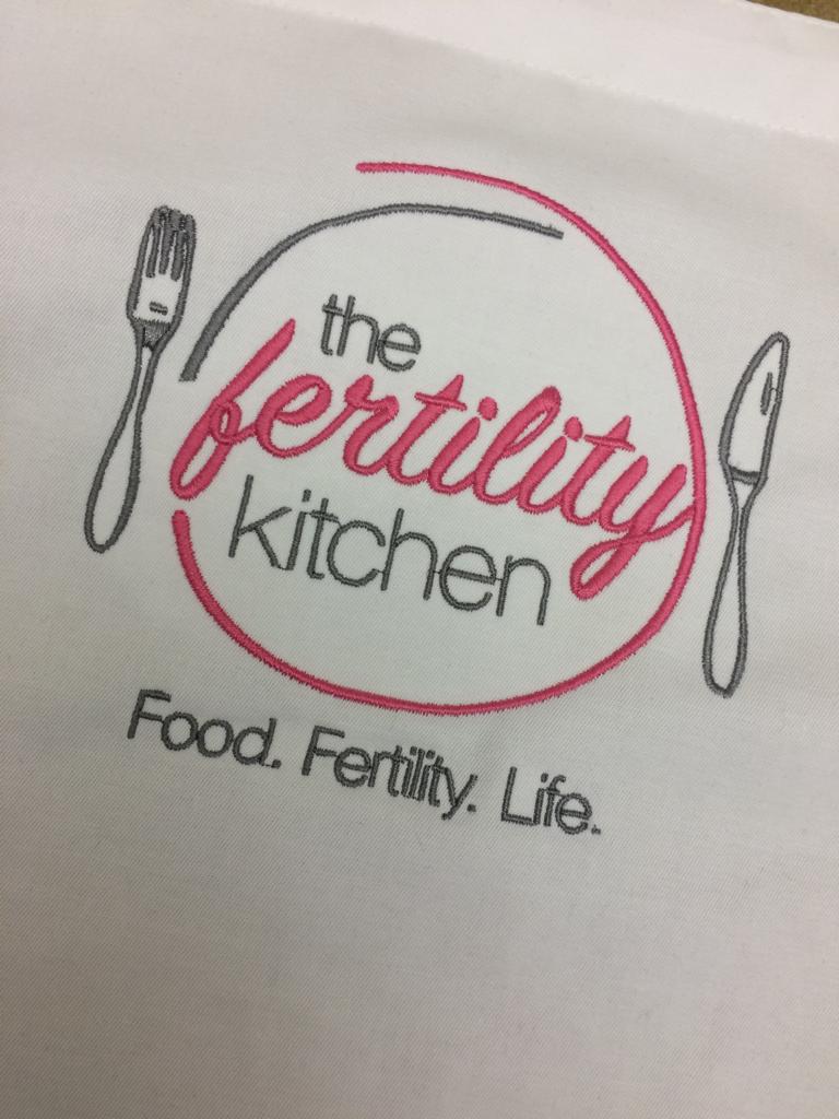 The Fertility Kitchen embroidered hospitality garment